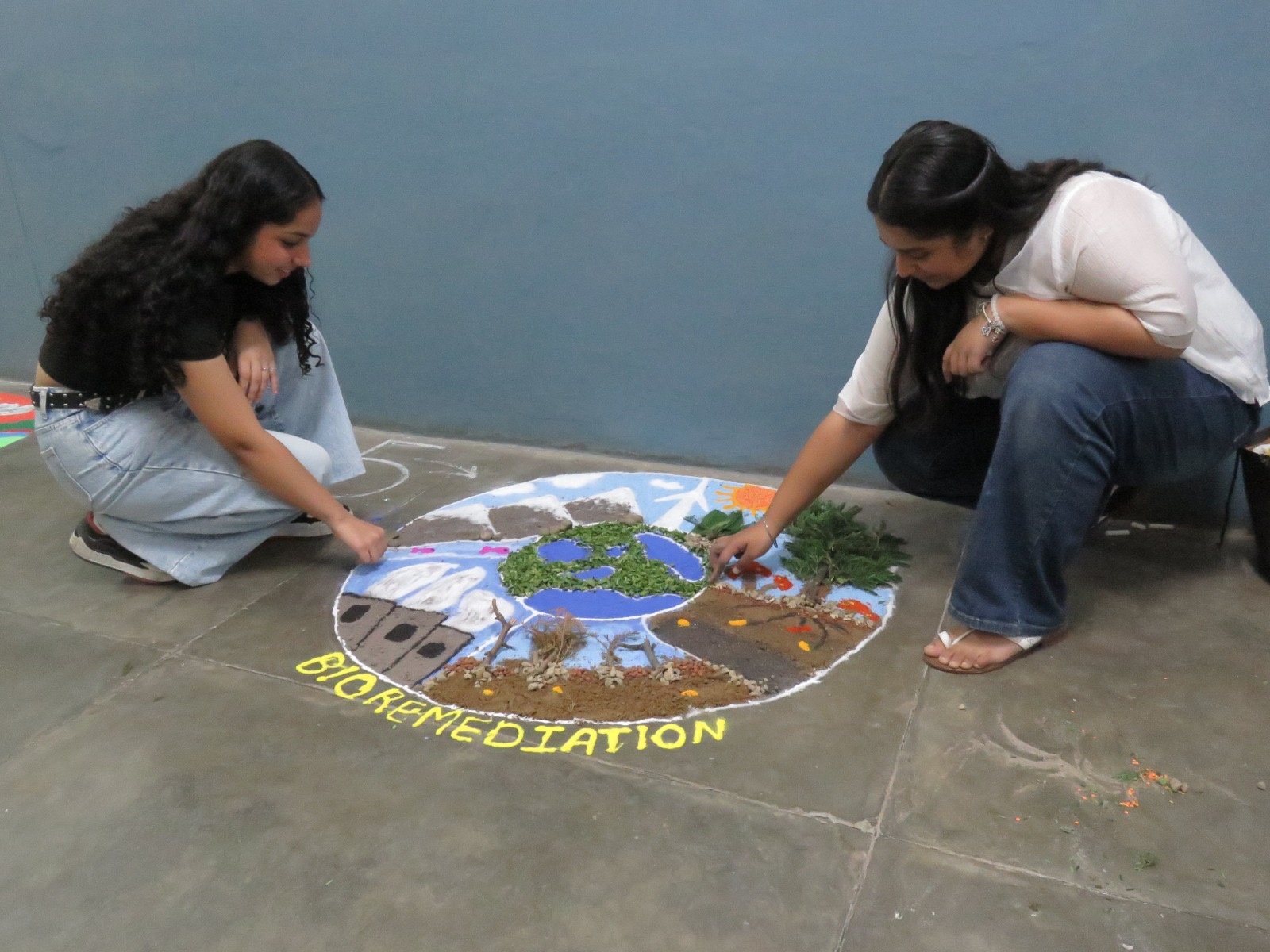 Bioremediation through Eco-Rangoli — creative student expression at the International Microorganism Day celebration (Oct 11, 2025).